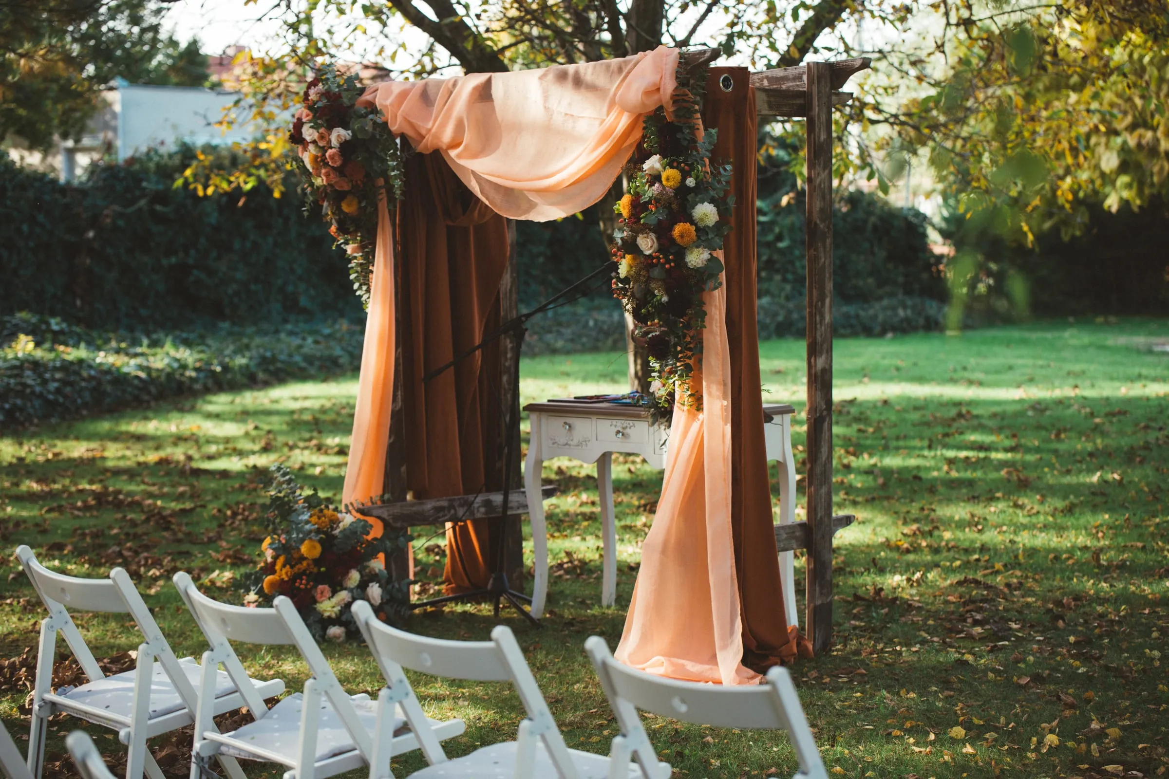 Draped wedding arch in the park